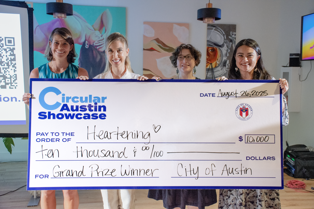 Heartening accepts the $10,000 grand prize from Austin Resource Recovery staff at the 2025 Circular Austin Showcase. 
