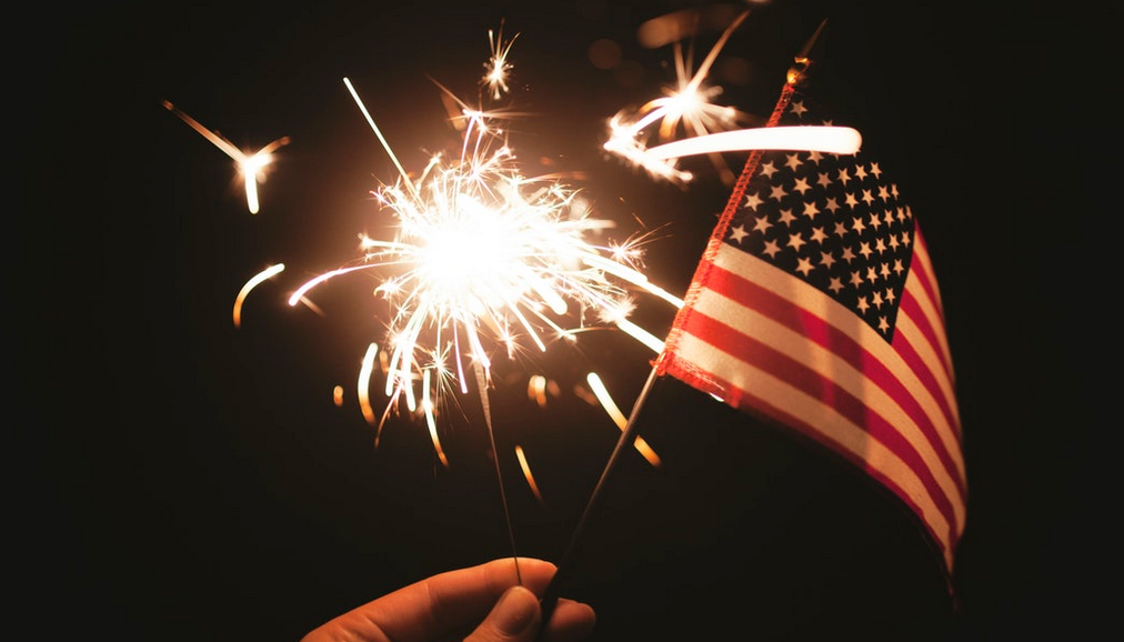 American flag with sparkler lit up