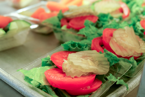 Close-up of small salads.