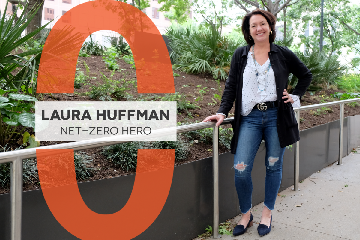 Net-Zero Hero Laura Huffman, photo of Laura with green plants in the background.