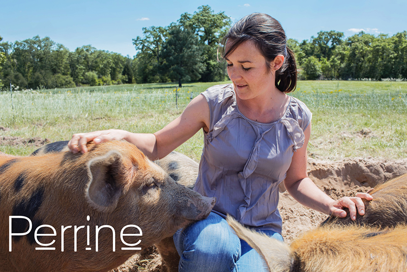 Perrine with livestock on her farm.