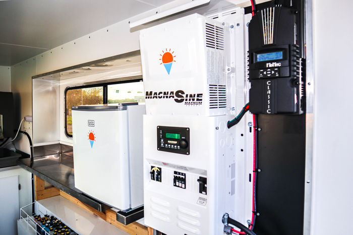 Solar inverters and equipment inside trailer.