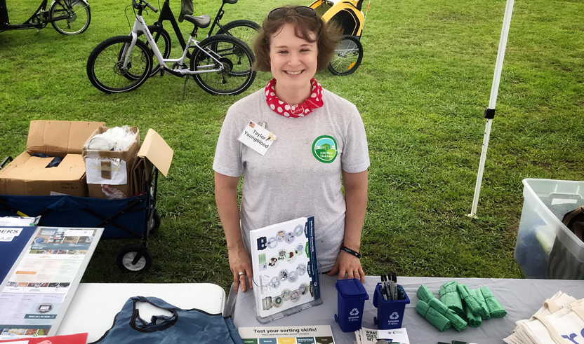 Taylor tabling at an outreach event.