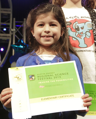 Young Girl Holding Certificate