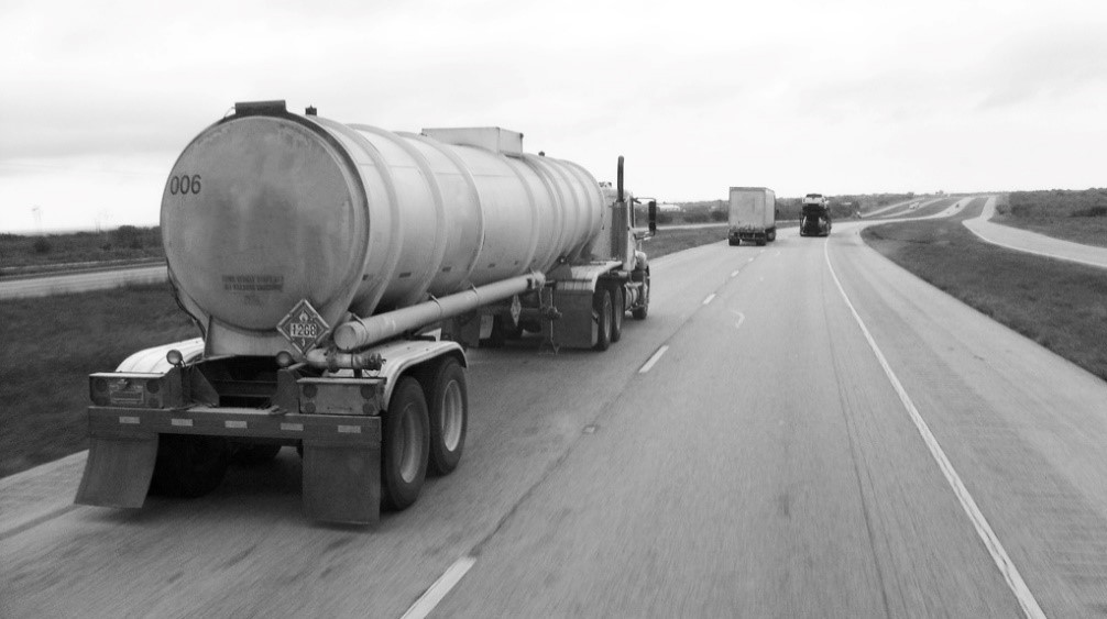 Photo of a large cargo truck on a highway.