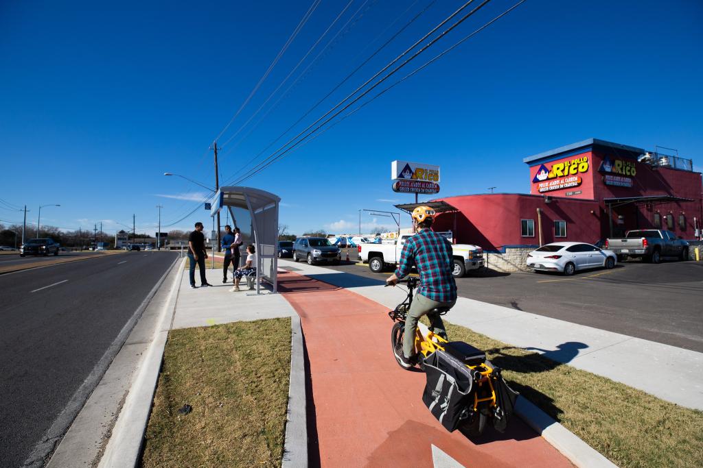 A bus stop and bicycle lane in Austin