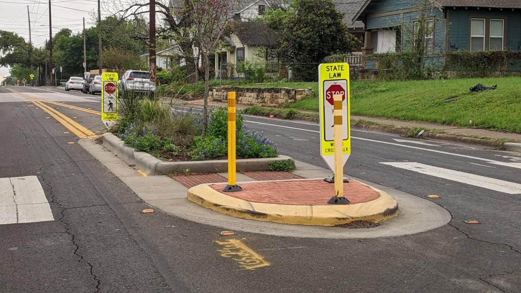 A pedestrian crossing island in Austin