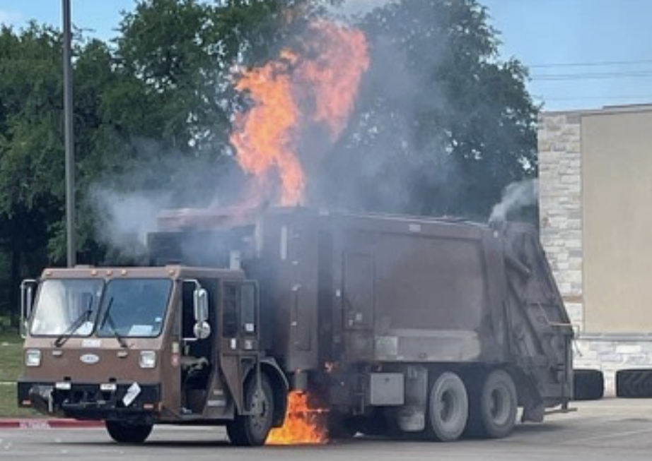 "Trash truck on fire"
