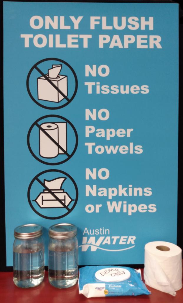Image with the words "Only flush toilet paper" and mason jar and toilet paper supplies beneath the words.