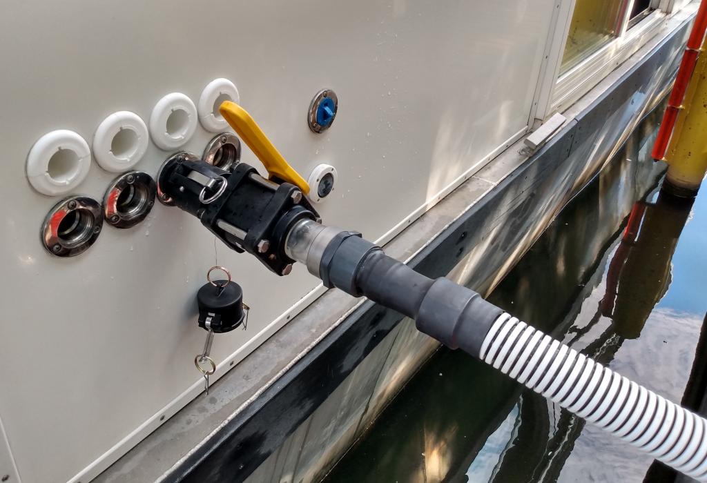 hose attached to MSD waste fitting