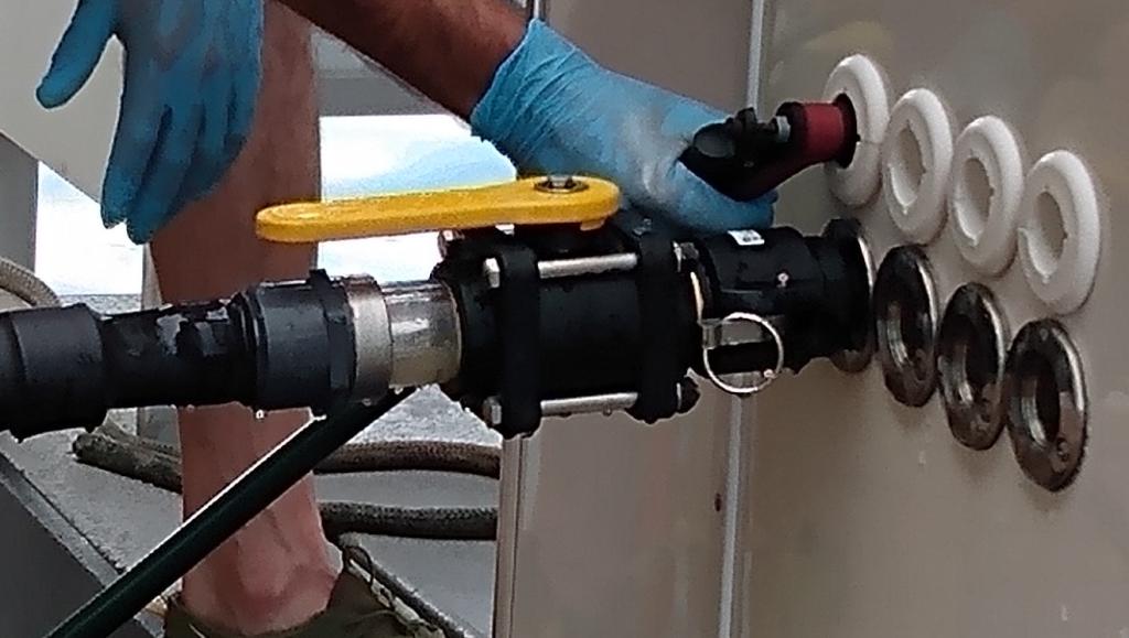 a spray nozzle is flushing the MSD system 