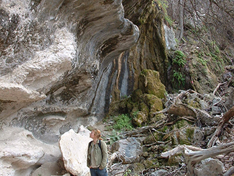 Bluffs.  An abrupt vertical change in topography of 40 feet or greater in height.  