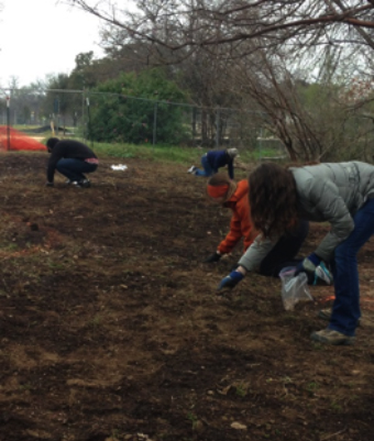 People planting seeds.