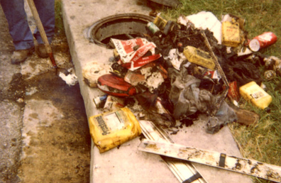 Illegal dumpiong of trash and debris in a storm drain.