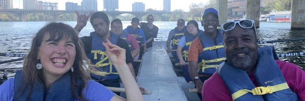 Individuals Rowing on Lake Austin