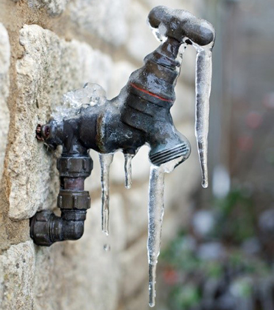 Frozen exterior water faucet.