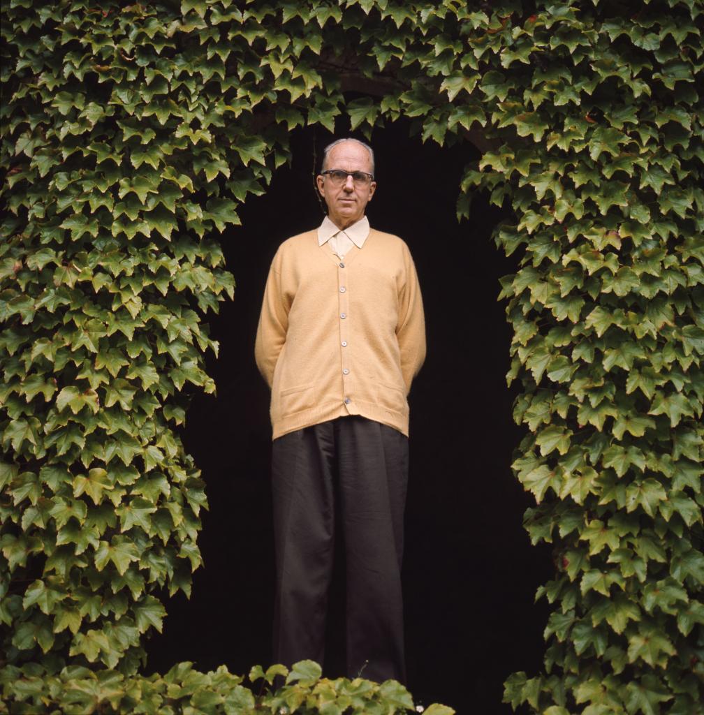 "James Michener surrounded by ivy circa 1960"