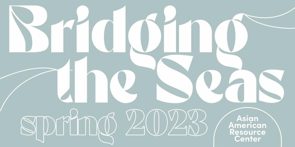 Bridging the Seas exhibit banner in white font with seafoam green background