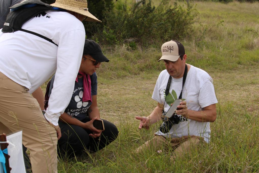 Citizen scientists gather data in a preserve. 