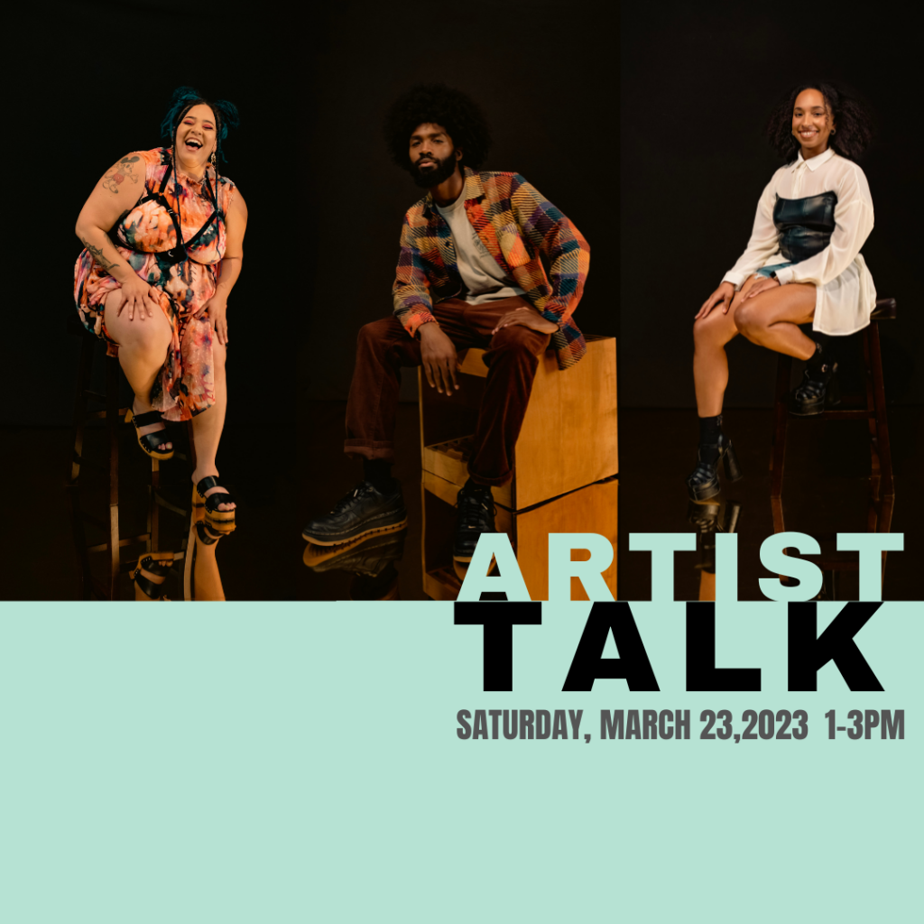 3 artists sitting on stage 