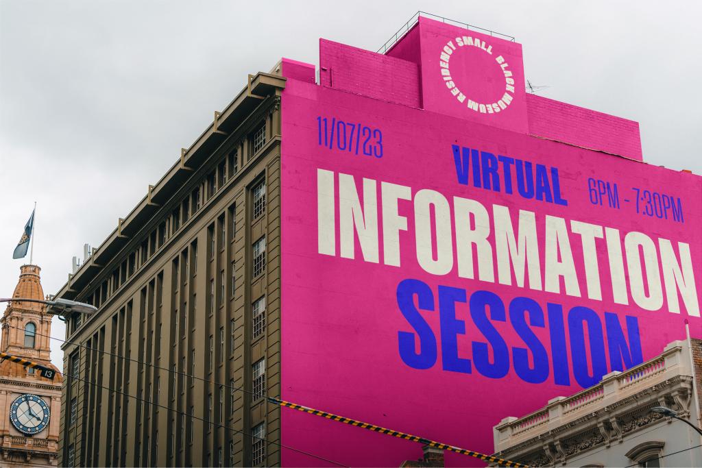 pink sign on building