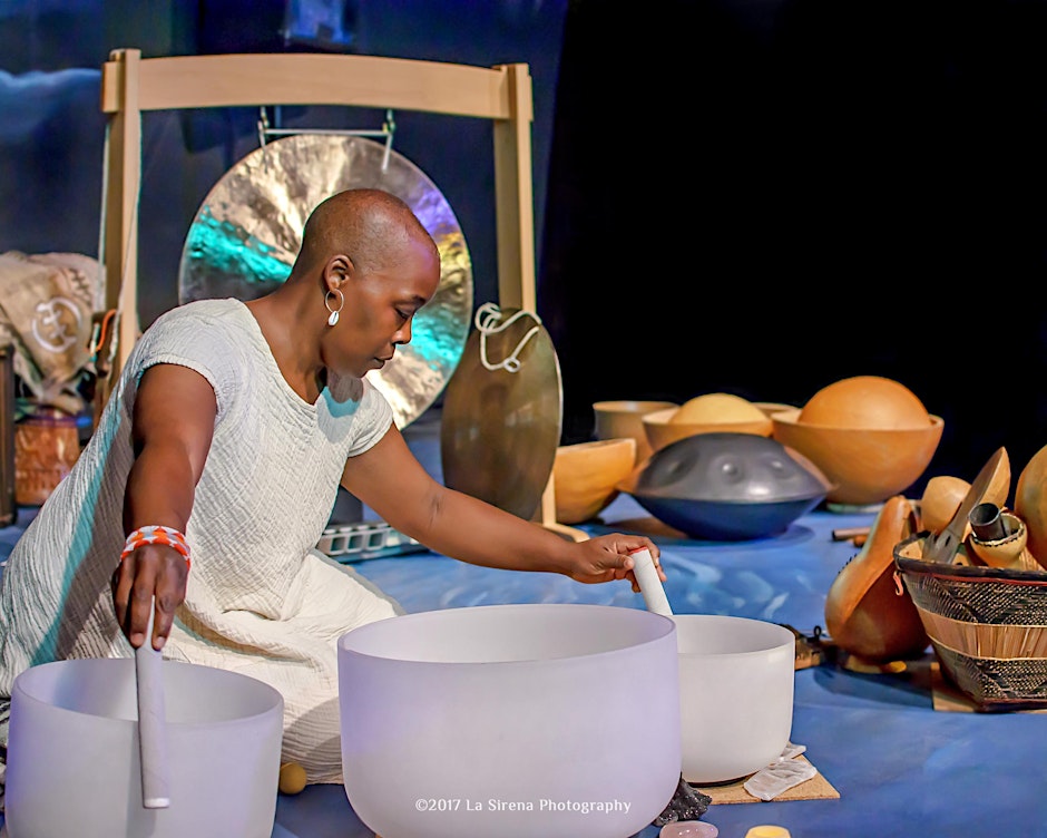 woman giving a sound bath