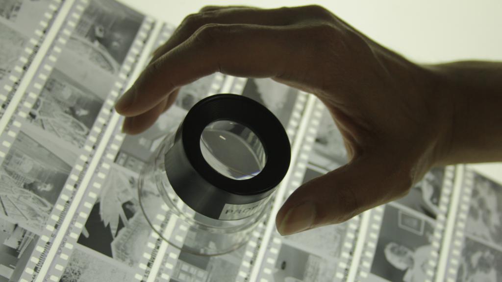 Examining negatives for darkroom photograph development
