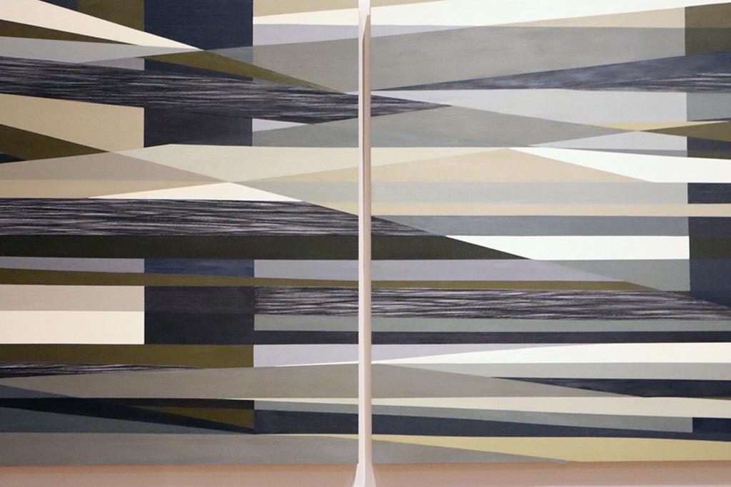 An abstract piece of art constructed from various rectangles and free form shapes. 