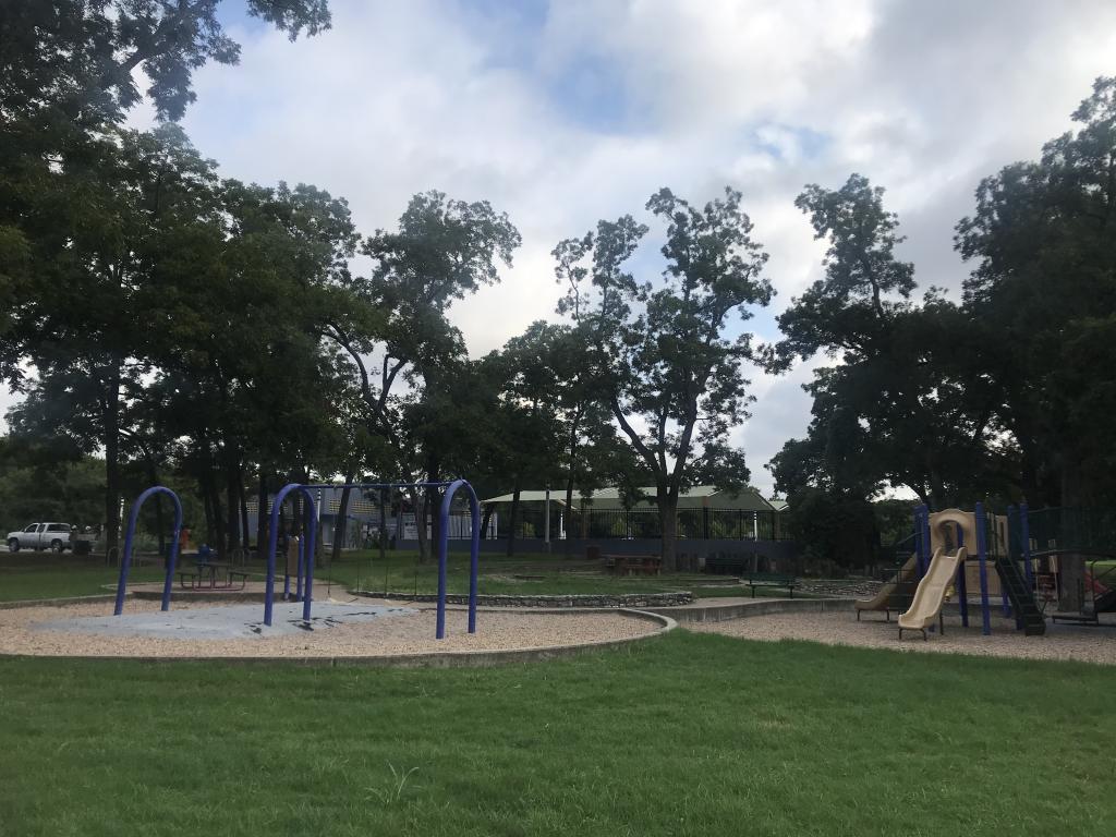 Image of swings and picnic tables at Govalle Neighborhood Park