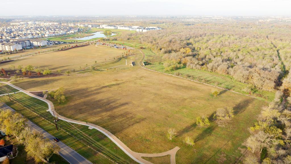 Image of field in Onion Creek Metropolitan Park, site of where future playground will go