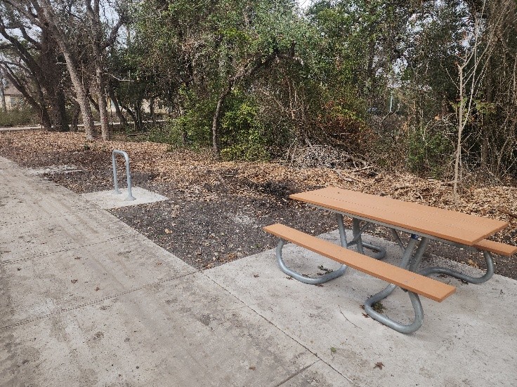 Photo of new picnic table and bike rack installed at Ridgeline Neighborhood Park.