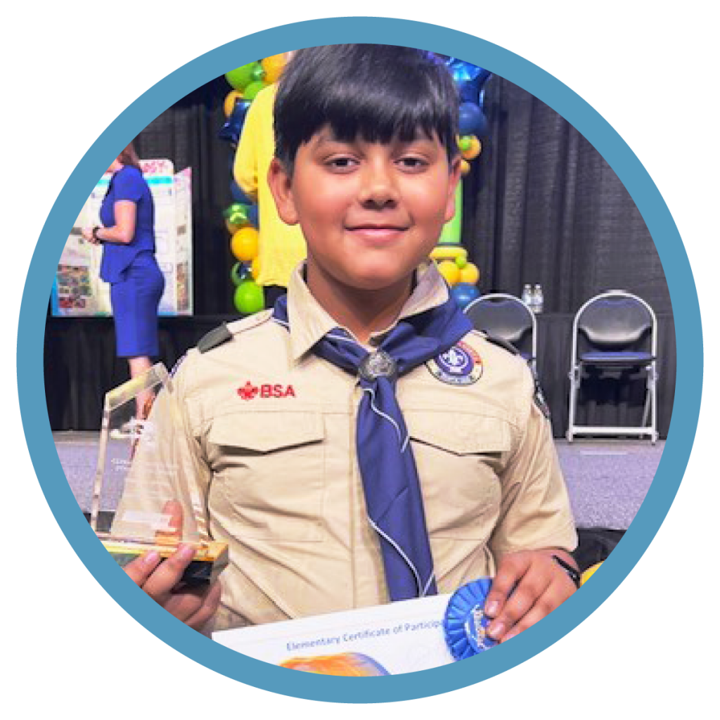 Anirudh Deepak poses with his award at the Science Fest.