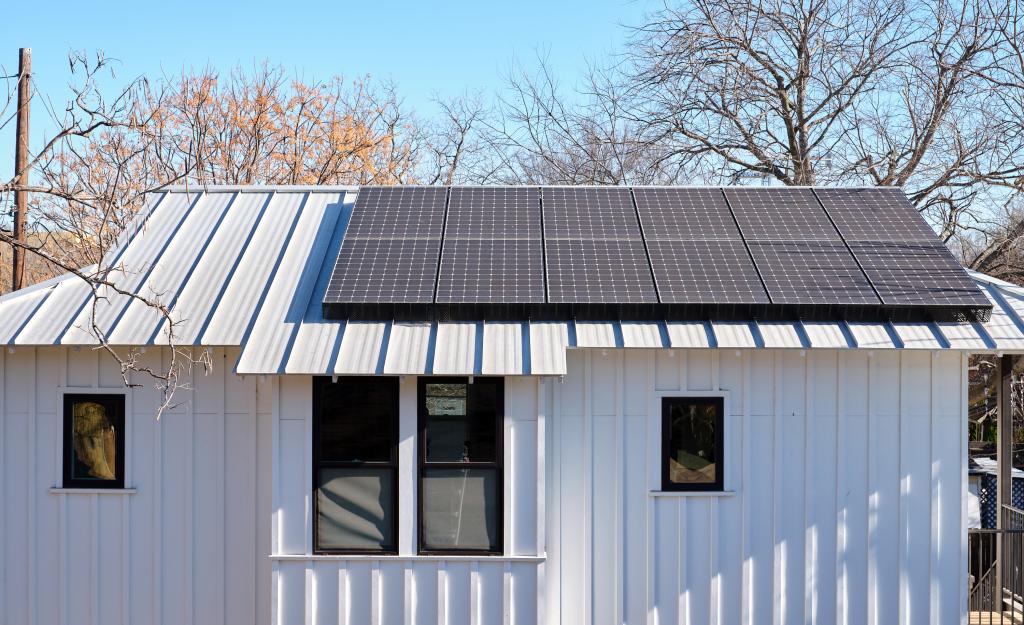 Home with solar panel on roof.