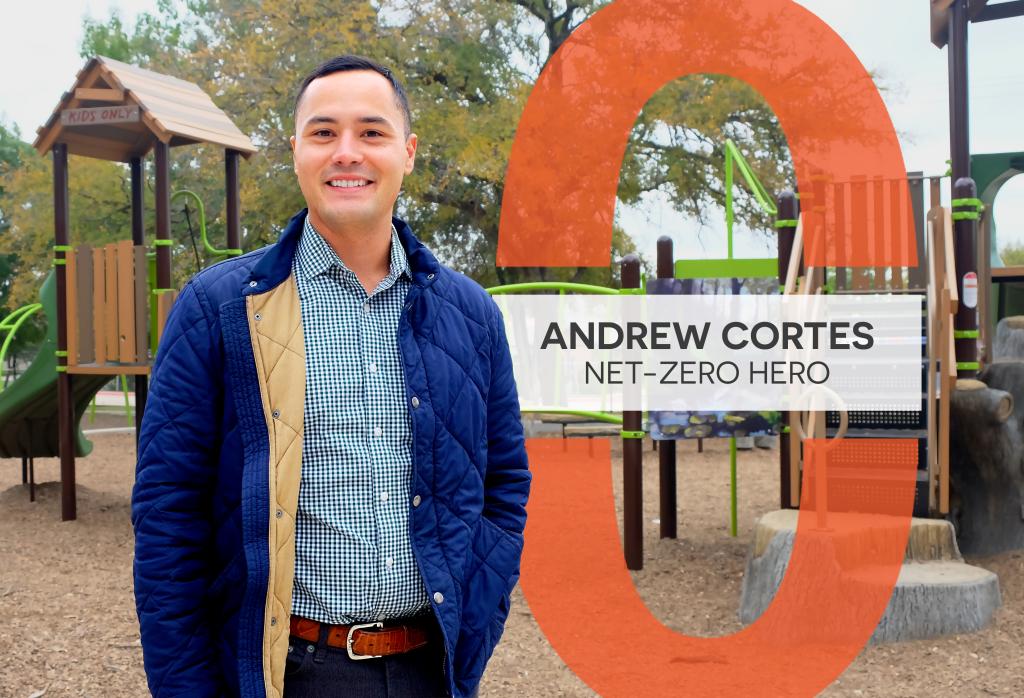 Andrew stands in front of the playground at T.A. Brown Elementary. A graphic reads, "Andrew Cortes: Net-Zero Hero."