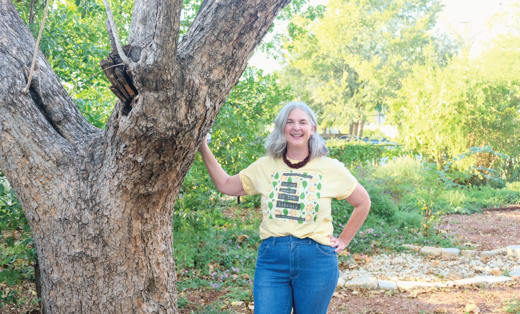 Colleen smiles in her client’s completed yard.