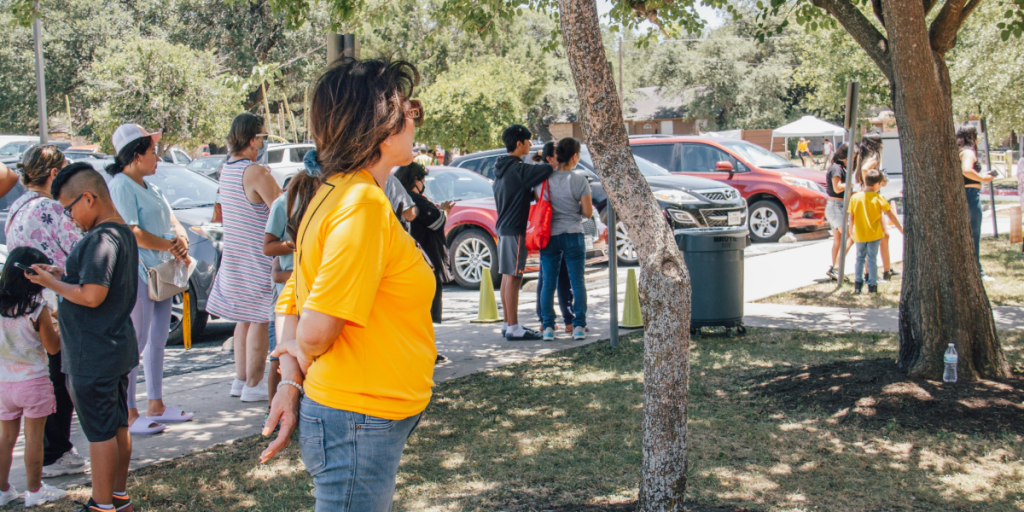 Families line up for a COVID-19 vaccine distribution event hosted at El Buen Samaritano.