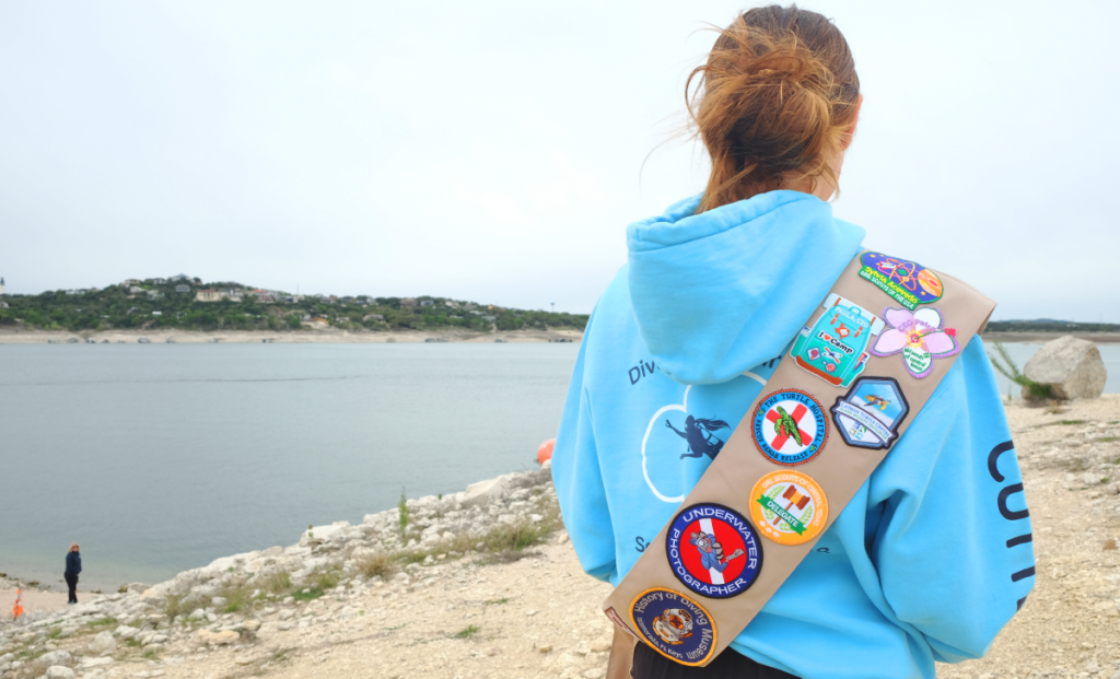 Scout AJ looks out over Lake Travis.