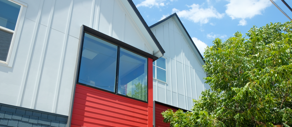 Detail photo of the roofline of the Roosevelt Gardens property.