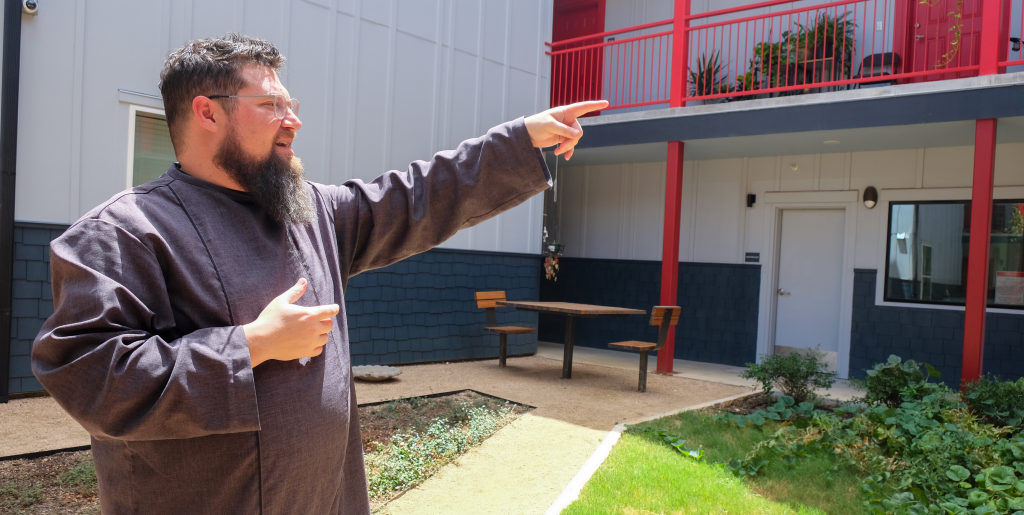 Jason points out some sustainable features in the Roosevelt Gardens development.