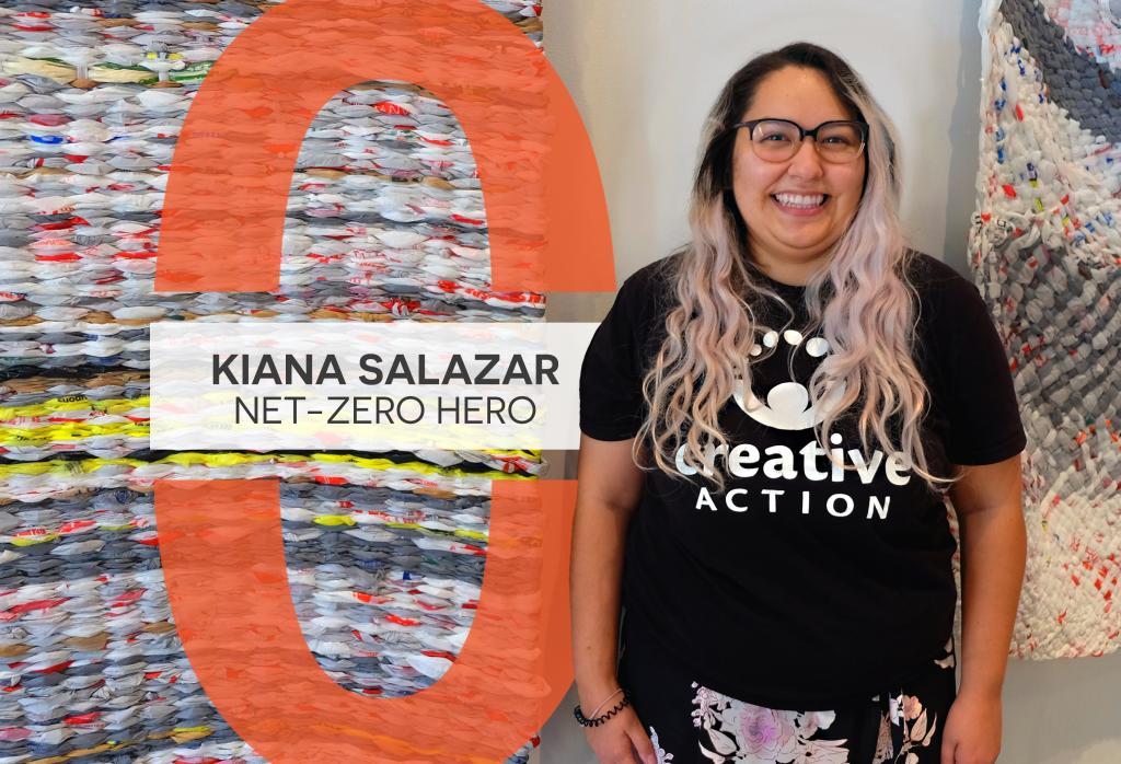 A photo of Kiana Salazar standing in front of hanging woven mats made out of grocery bags.