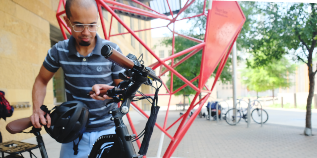 Sagar gets his e-bike from Mod Bikes, a local company, ready for a ride.