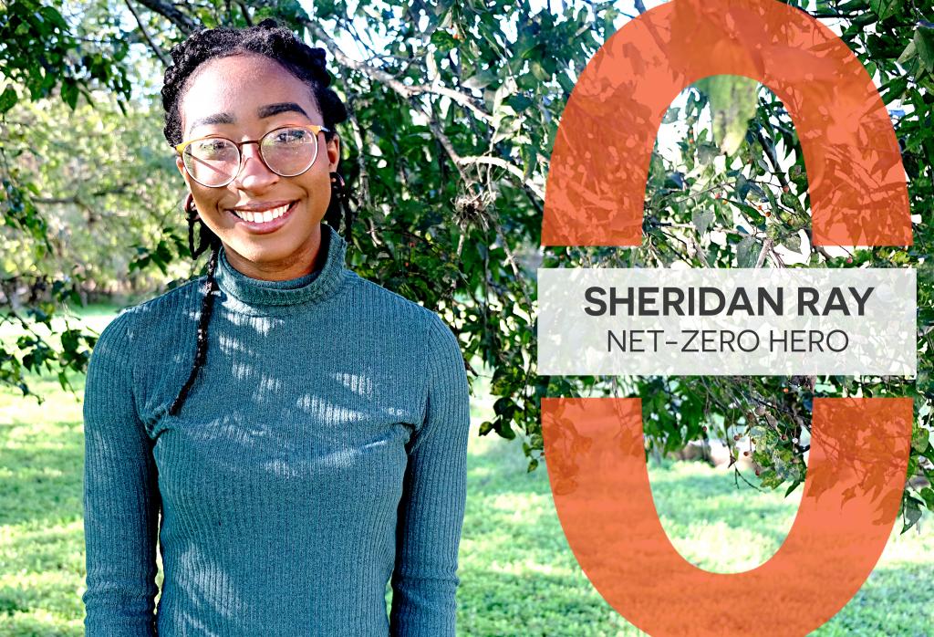 A photo of Sheridan Ray standing under a tree. A graphic on it reads, "Sheridan Ray: Net-Zero Hero".