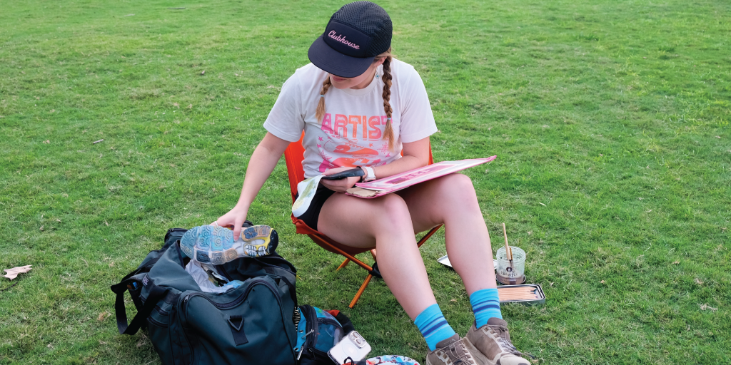 Thira with her art supplies at Zilker Park.