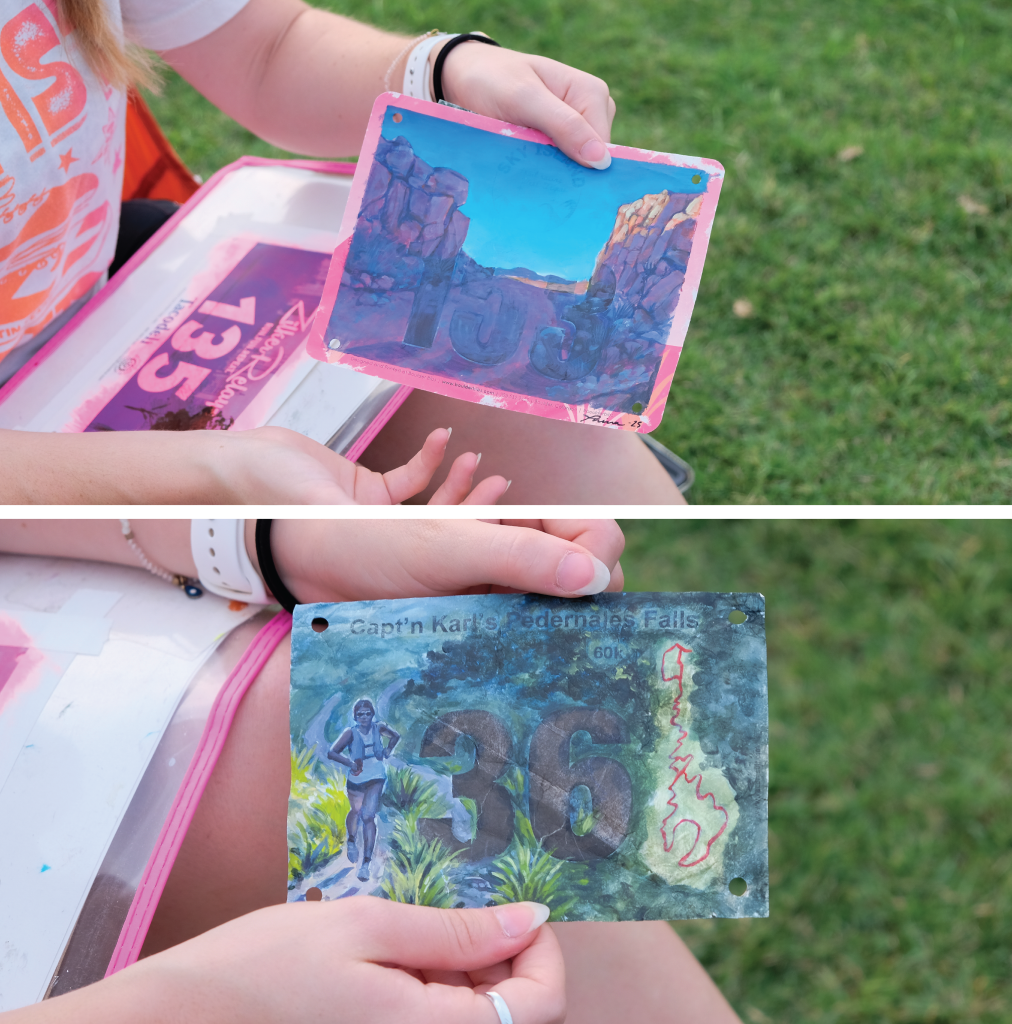 Thira shows a couple of her race bib paintings.