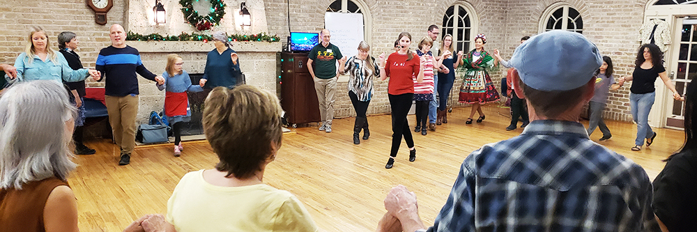People dancing at a community event.