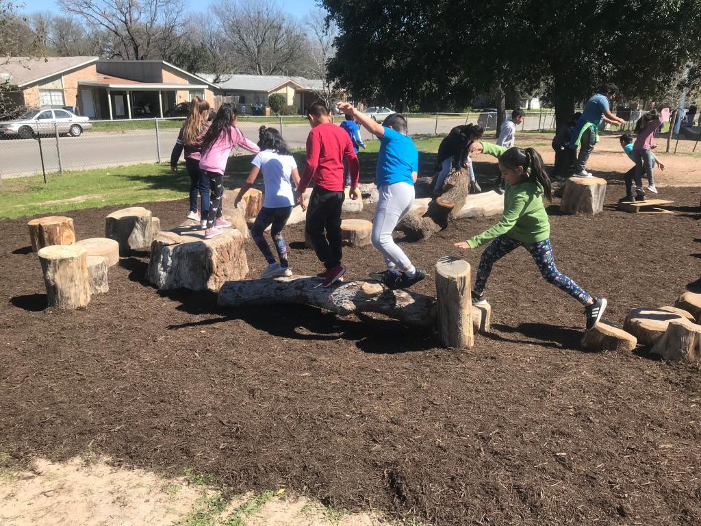 Wooldridge Elementary School Park, children jumping and playing 