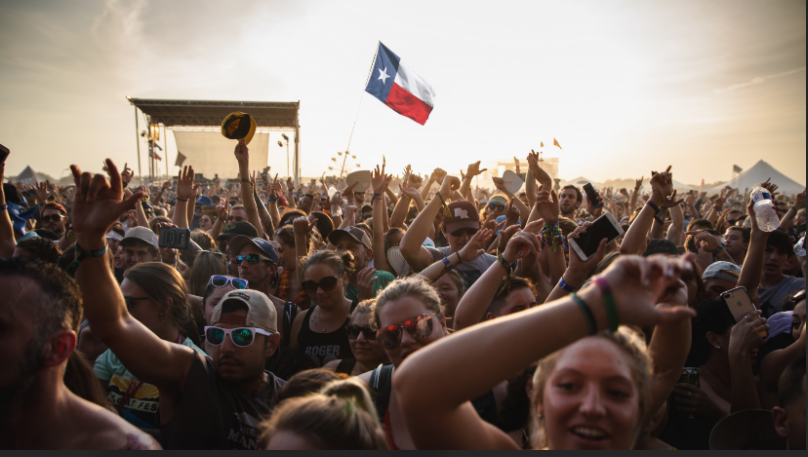 people gathering at an outdoor event