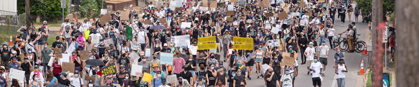 Protestors marching in the streets 