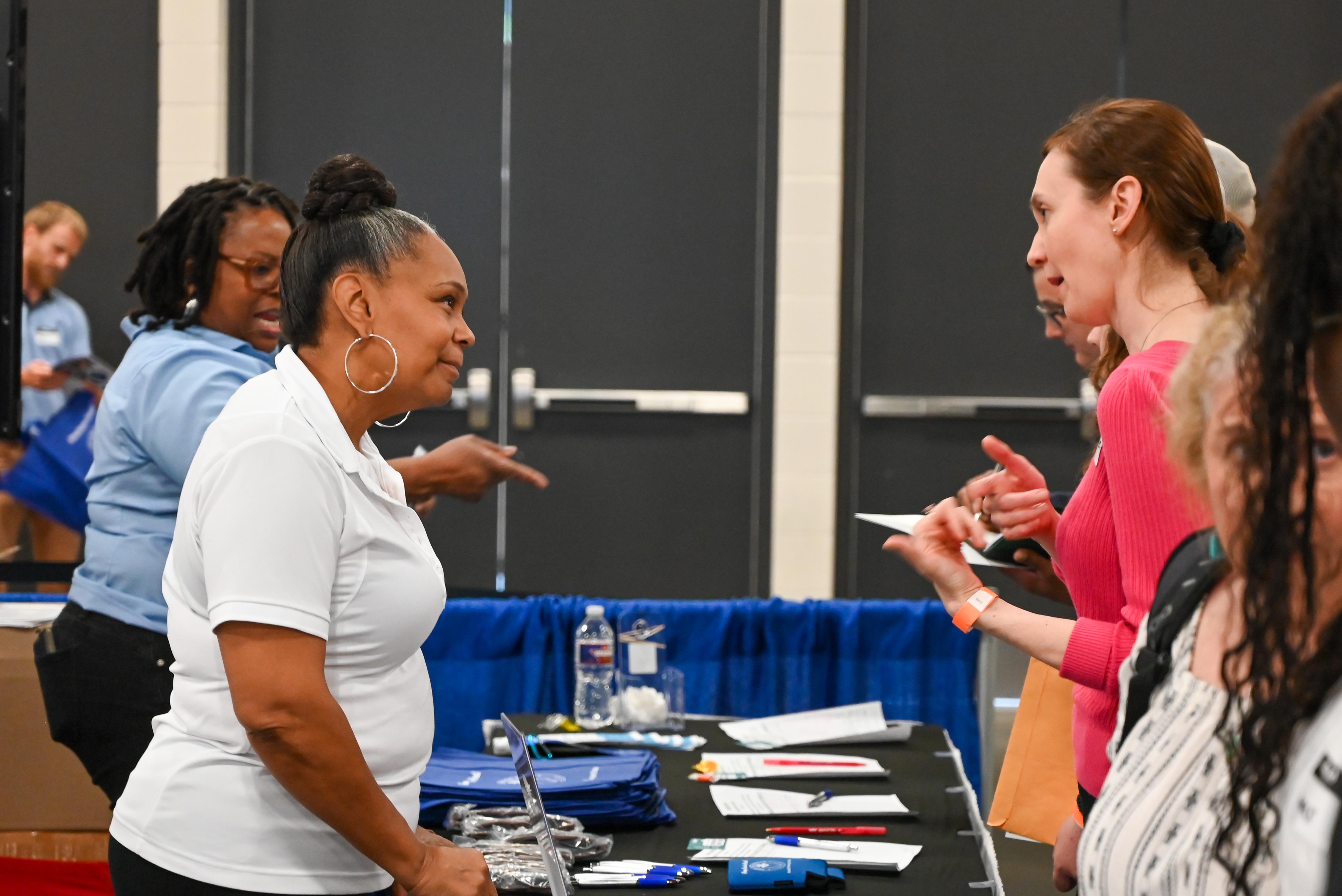 Woman speaking to candidate about employment