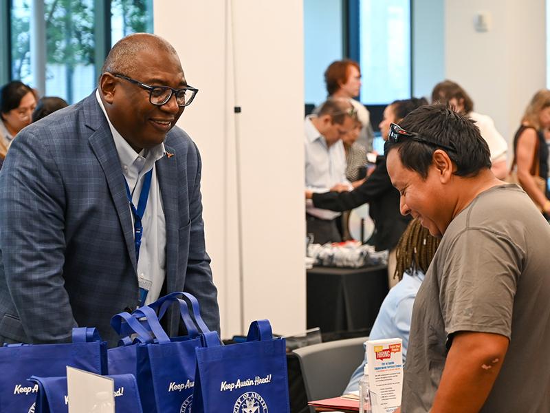 People interacting at the City's Job Fair